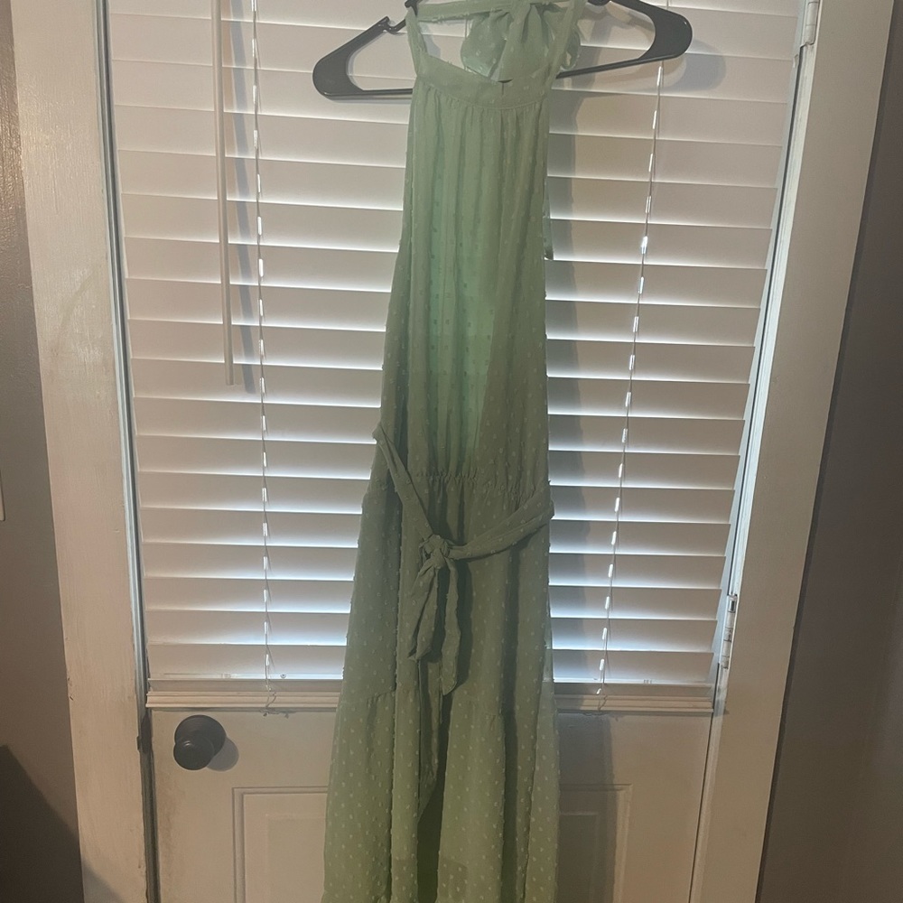 Green high neck. Tie belt. Short under dress with long over layer